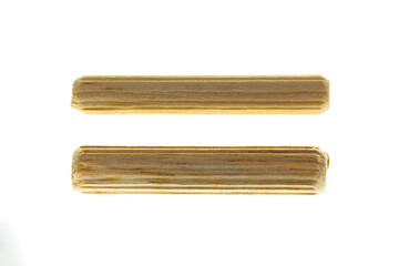 8 and 6 mm Wooden pegs on white background