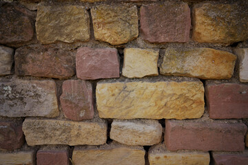 Hintergrund Steinmauer Natursteinmauer aus roten Steinen