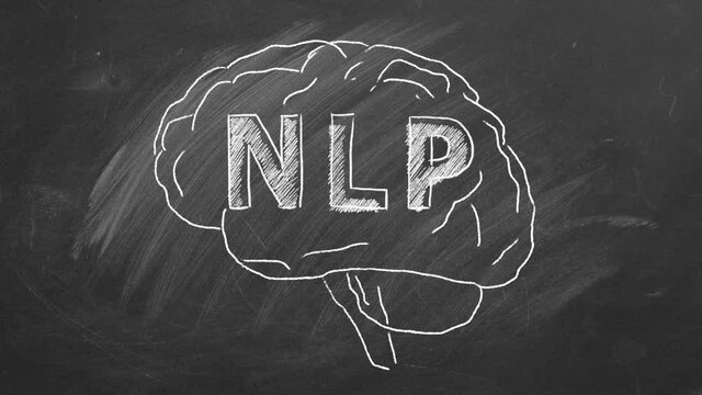 Chalk drawing of the human brain in the blackboard with lettering NLP inside.