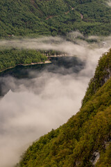Bohinj lake covered in mist