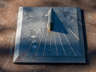 Granite Sundial - sun clock on granite table