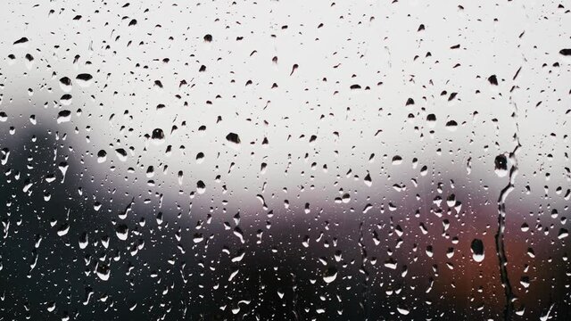 rainy days .rain falling on window surface 