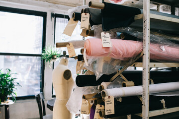 rows of bolts of fabric