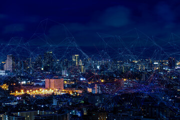 Fototapeta na wymiar Modern city with wireless network connection and city scape concept.Wireless network and Connection technology concept with city background at night.