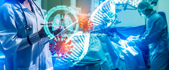 Doctor or Surgeon analyzing covid-19 to patient lungs testing result and human anatomy on technological digital futuristic virtual interface.Doctor with virtual reality in operation room in hospital.