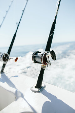 Fishing Rods And Spools Trolling From Back Of Boat