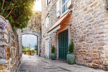 Fototapeta na wymiar Traditional adriatic street in the Old Town Of Budva, Montenegro