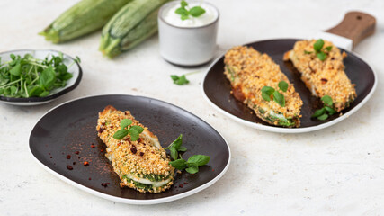 Baked zucchini with mozzarella cheese and spices.Vegetarian sandwich