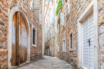 Empty narrow street of Budva Old Town, Montenegro, no people