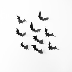 Paper bats decorations on a white background. Halloween concept. Hand made fall decor. Copy space for creative design