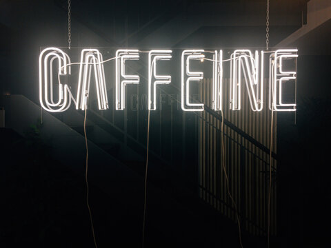 The Word Caffeine in Illuminated Light Letters