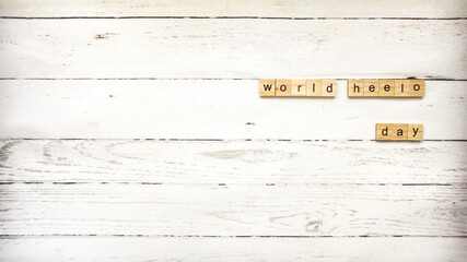 world greetings day.World Hello Day. wooden cubes with letters.