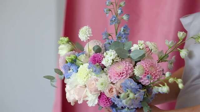 bouquet of flowers in woman hands