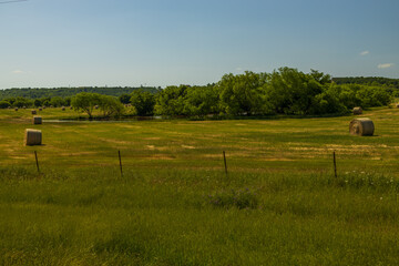 Fototapeta premium Round haybales in a field