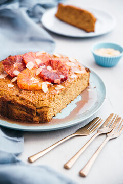 Food: Vegan cake with cornmeal, almond flour, tangerines and blo