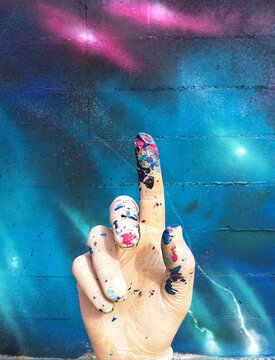 Hand with a painted glove