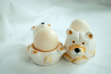 Eggs for Breakfast. Egg stands in the form of bears. It's good to eat protein in the morning.
