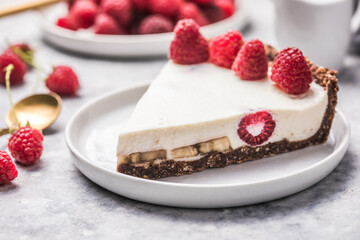Homemade cheesecake with fresh raspberries. Delicious cheese cake with berries, healthy organic summer dessert pie