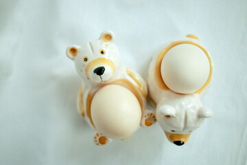 Eggs for Breakfast. Egg stands in the form of bears.