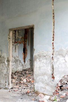 Ruin where electric cables were ripped out of the walls