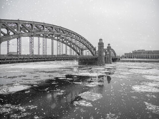 Iron bridge over the Neva river in Saint Petersburg in winter