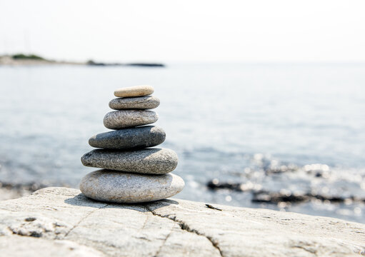 Stack of beach stones overlooking the ocean