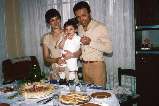 1979. A family celebrating a birthday
