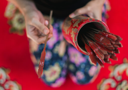 Asian woman cast lots