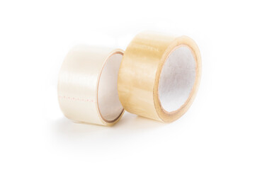 Transparent adhesive tape on a white background. One lighter second yellow. Close-up. isolate.