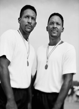 Male twins with medals