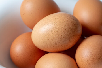 Eggs in a white magnetic bowl