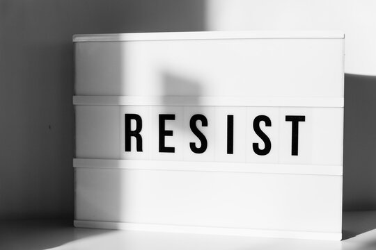 Lightbox with the word Resist