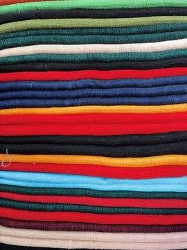 Multi-colored cloths stacked