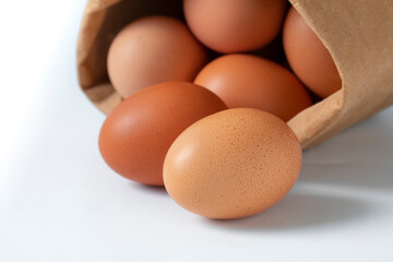 Fresh eggs, packed in kraft paper bags
