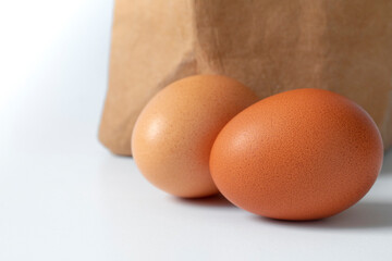 Fresh eggs, packed in kraft paper bags