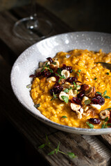 Pumpkin risotto with hazelnuts and cranberries 