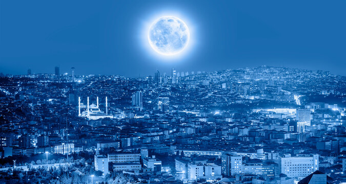 Blue background concept - Ankara, Capital city of Turkey with full blue  moon "Elements of this Image Furnished by NASA"
