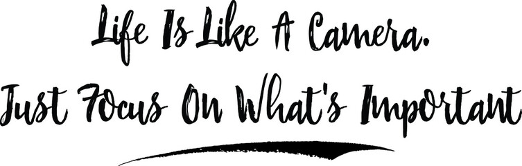 Life Is Like A Camera. Just Focus On What's Important Calligraphy Handwritten Black Color Text On Yellow 
Background