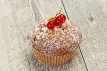 Sweet tasty muffin with red currants