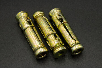 Expansion plug or dowels on a black background to hold