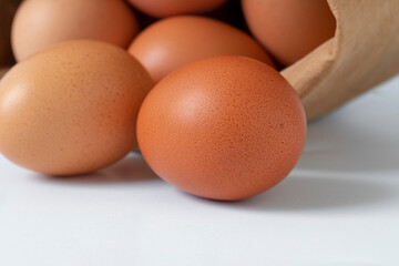 Fresh eggs, packed in kraft paper bags