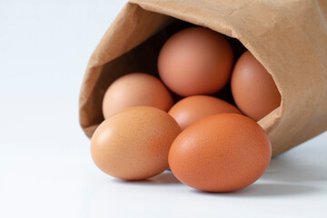 Fresh eggs, packed in kraft paper bags