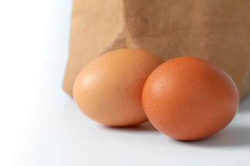 Fresh eggs, packed in kraft paper bags