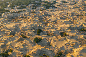 Desert sunset. Beautiful desert with warm colors. Top view Аleshkovskaya desert in Ukraine