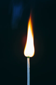 Close up lit match and flame