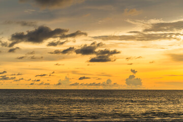 Beautiful sunset on the beach and sea, at Phuket Thailand.