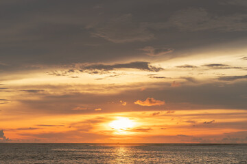 Beautiful sunset on the beach and sea, at Phuket Thailand.