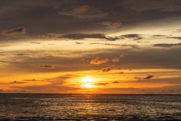 Beautiful sunset on the beach and sea, at Phuket Thailand.