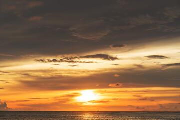Naklejka na ściany i meble Beautiful sunset on the beach and sea, at Phuket Thailand.