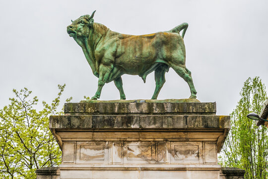 Park George Brassens is a public park located in the 15th arrondissement. At main entrance to park on rue Morillons are two pillars bearing statues of two large bulls (1878). Paris, France.